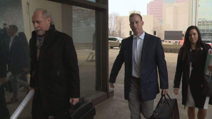 Travis Vader heads into court in Edmonton for day one of his first-degree murder trial Tuesday, March 8, 2016.