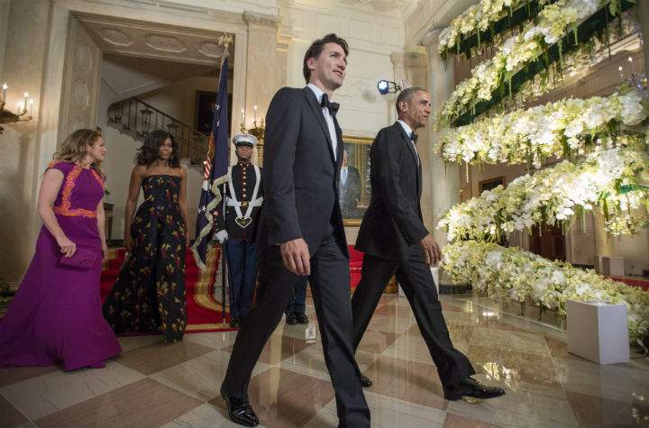 President Barack Obama and first lady Michelle Obama with Canadian Prime Minister Justin Trudeau and Sophie GrÃ©goire Trudeau walk into the White House in Washington, Thursday, March 10, 2016, as they arrive for a state dinner.