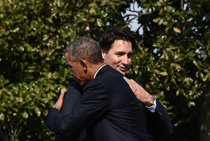 President Barack Obama and Prime Minister Justin Trudeau hug during a welcome ceremony during a State Visit at the White House on March 10, 2016 in Washington, D.C
