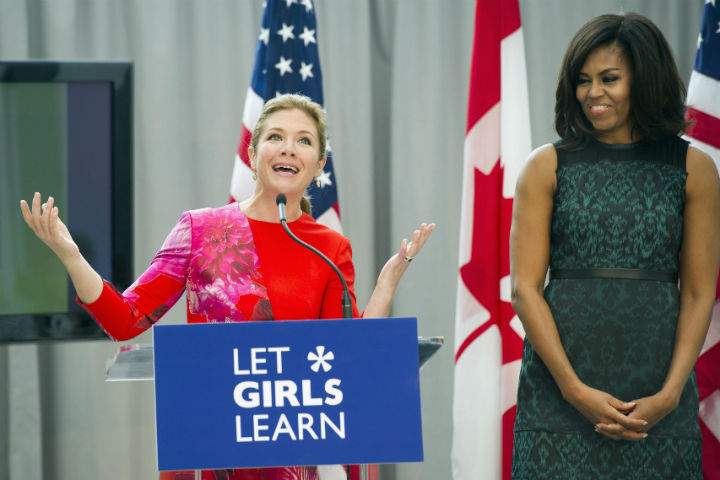 First lady Michelle Obama listens as Sophie Grégoire-Trudeau, wife of Canadian Prime Minister Justin Trudeau, speaks during a program at the U.S. Institute of Peace in Washington, Thursday, March 10, 2016, to highlight Let Girls Learn efforts and raise awareness for global girl’s education.