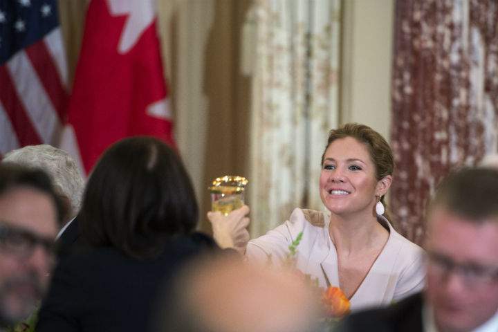 Sophie Gregoire-Trudeau raises her glass as Prime Minister Justin Trudeau and U.S. Secretary of State John Kerry make a toast during a working lunch at the US State Department in Washington, D.C.