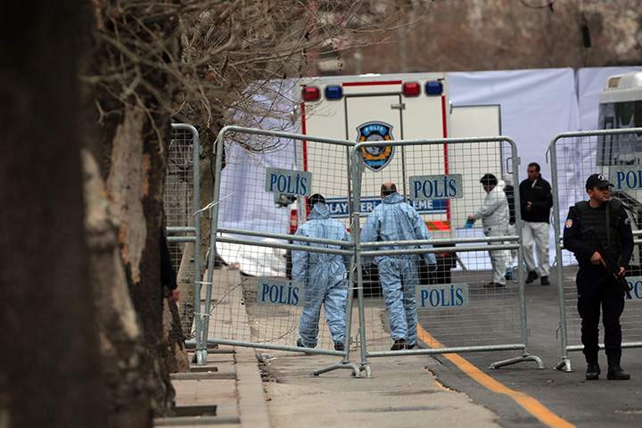 Security and forensic officials work at the site of Sunday's explosion in the busy centre of Turkish capital, Ankara on Monday, March 14, 2016. 