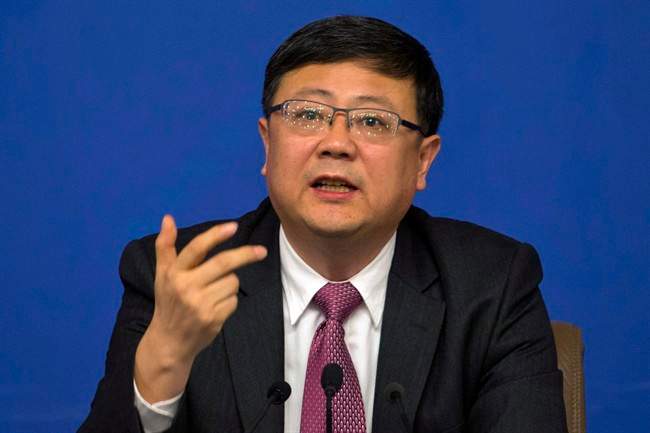 Chinese Environment Minister Chen Jining speaks during a press conference for the National People's Congress in Beijing, China, Friday, March 11, 2016. 