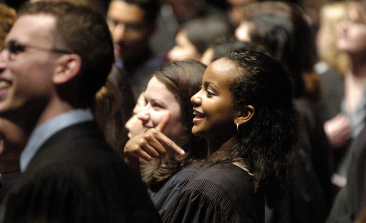 Fahima Osman receives her Doctor Of Medicine at McMaster University's Faculty of Health Sciences convocation on May 14, 2004. Research indicates the gap between women's and men's pay grows among higher-earning, higher-achieving groups.