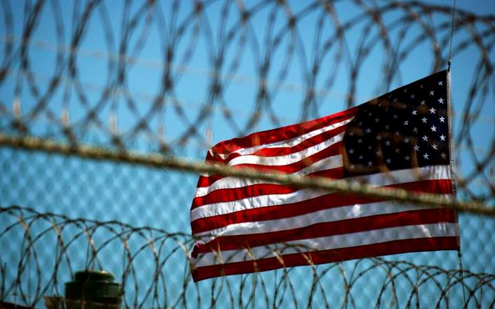 A US flag at Delta Camp 5 on the United States Naval Station in Guantanamo Bay, Cuba. 