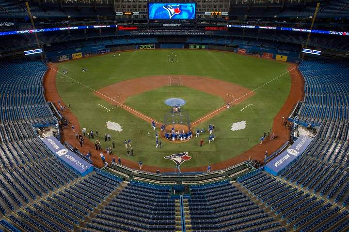 Toronto Blue Jays take to a newly-designed field at the Rogers Centre in Toronto on Thursday, April 7, 2016.