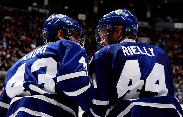 Nazem Kadri #43 and Morgan Rielly #44 of the Toronto Maple Leafs celebrate Morgan Rielly goal against the Tampa Bay Lightning during game action on March 31, 2015 at Air Canada Centre in Toronto, Ontario, Canada. (Photo by Graig Abel/NHLI  via Getty Images).