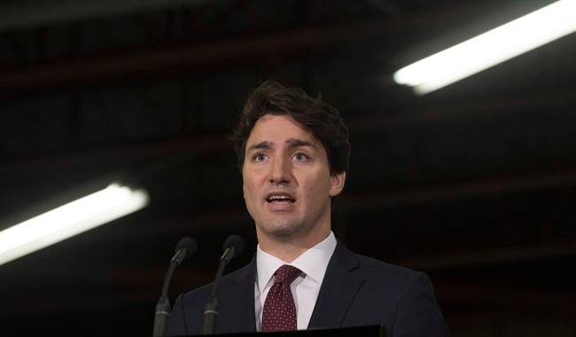 Prime Minister Justin Trudeau speaks during an announcement at a bus depot in Sault Ste. Marie, Ont., on Friday, April 8, 2016.