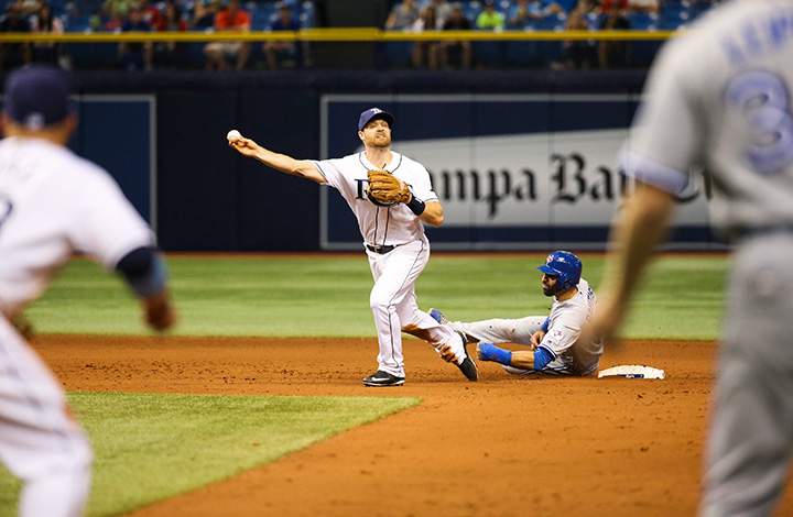 Toronto Blue Jays’ Jose Bautista interferes with Tampa Bay Rays second baseman Logan Forsythe as he looks to turn a double play on a ball hit by Edwin Encarnacion, that ended the baseball game after review, in St. Petersburg, Fla., on Tuesday, April 5, 2016. The Rays won 3-2.
