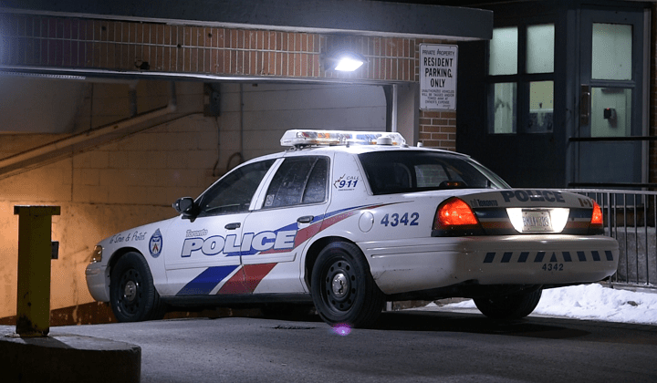 Police investigate a carjacking at an underground parking lot in Scarborough on April 6, 2016.