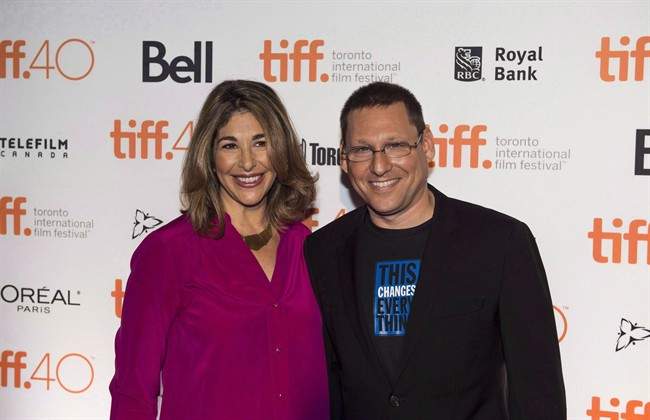 Director Avi Lewis, right, and author Naomi Klein of the film ‘This Changes Everything,’ stand for a photo on the red carpet during the Toronto International Film Festival press conference announcing the 2015 Canadian features and shorts lineup in Toronto on Wednesday, August 5, 2015. The Leap Manifesto is a document that calls for a radical restructuring of the economy as Canada swiftly moves toward ending the use of fossil fuels. It was crafted by best-selling author Klein and her husband, documentary filmmaker Lewis, and released last September in the midst of the federal election campaign.