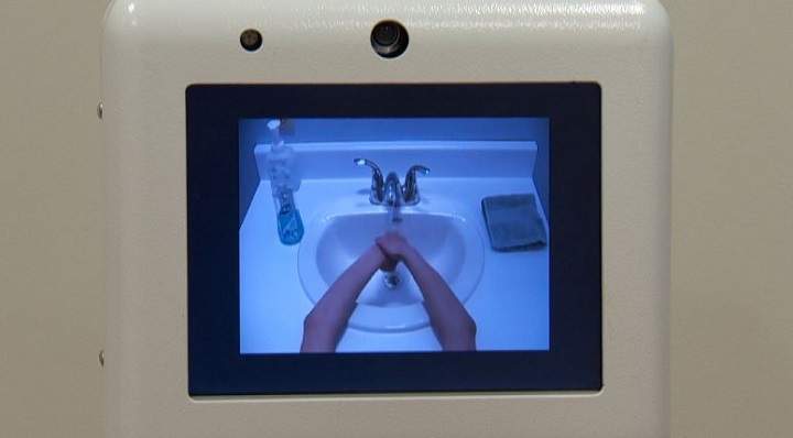 Ed the Robot prompts seniors with dementia to wash their hands.