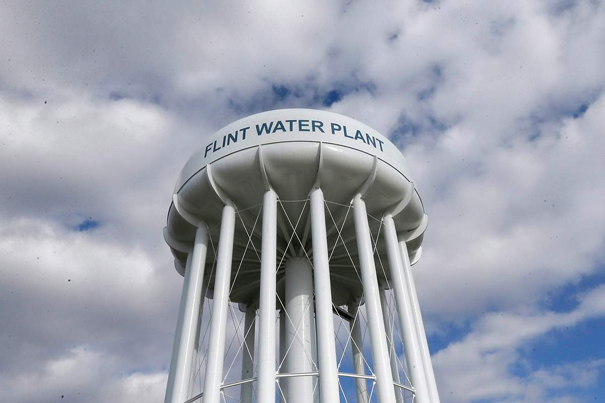 In a March 21, 2016 photo, the Flint Water Plant water tower is seen in Flint, Mich. 