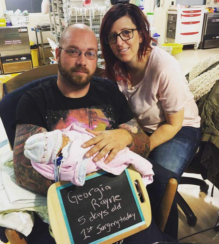 Gordon Lewis and Vanessa Marshall with their daughter Georgia in February 2016.