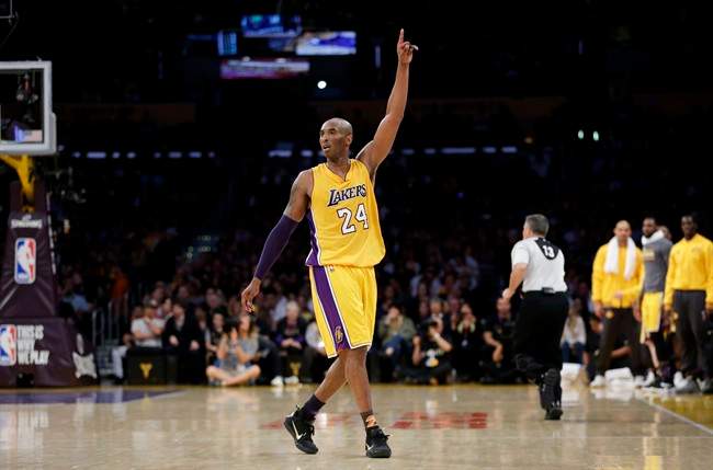 Los Angeles Lakers forward Kobe Bryant gestures during the first half of Bryant's last NBA basketball game, against the Utah Jazz, on Wednesday, April 13, 2016, in Los Angeles.