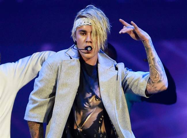FILE - In this March 20, 2016 file photo, Justin Bieber performs during his "Purpose World Tour" in Los Angeles.