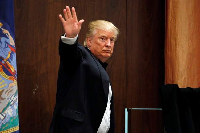 Republican presidential candidate Donald Trump waves leaving the stage after speaking to the New York Republican State Committee Annual Gala, Thursday, April 14, 2016, in New York. 