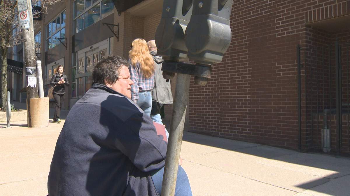 Aggressive panhandling pushing city, police, businesses to find solutions - image