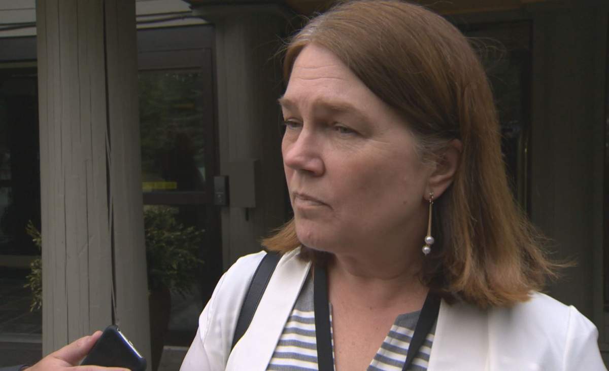 Health Minister Jane Philpott speaks to reporters outside a cabinet meeting in Kananaskis, Alberta's about a marijuana legalization task force. 