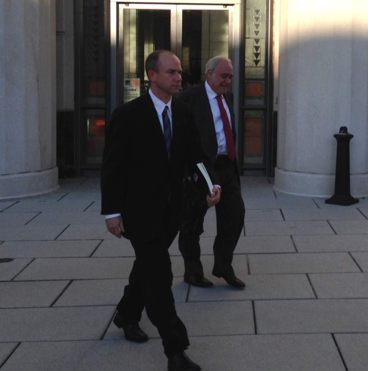 Chris Blanchard walks out of a US courthouse.