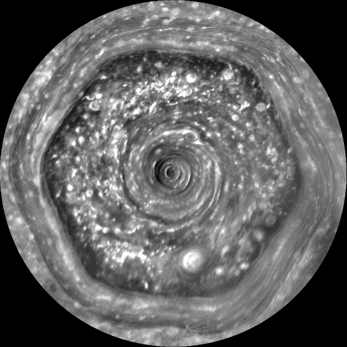 This series of images from Cassini show the strange hexagonal storm swirling at Saturn’s north pole.