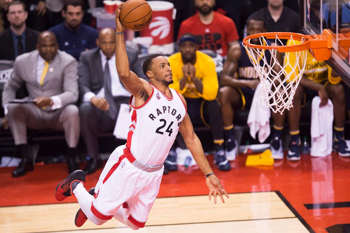 Toronto Raptors guard Norman Powell (24) slam dunks the ball against the Indiana Pacers.