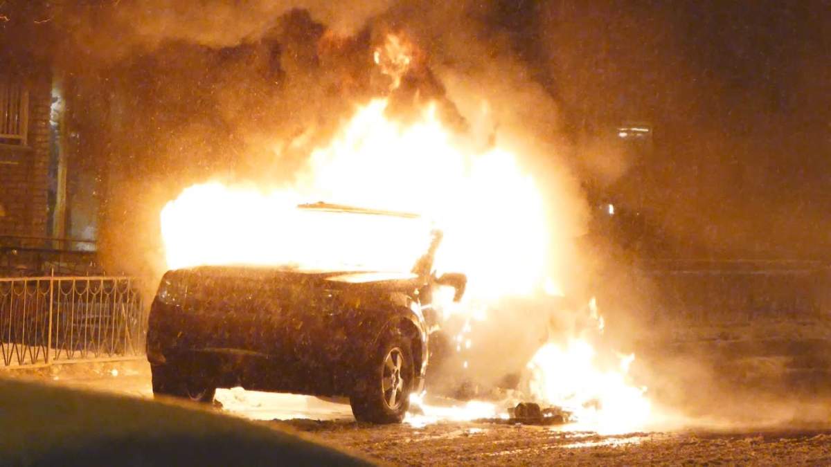 A car that was set on fire during anti-police brutality protests in Montreal North, Wednesday, April 6, 2016.