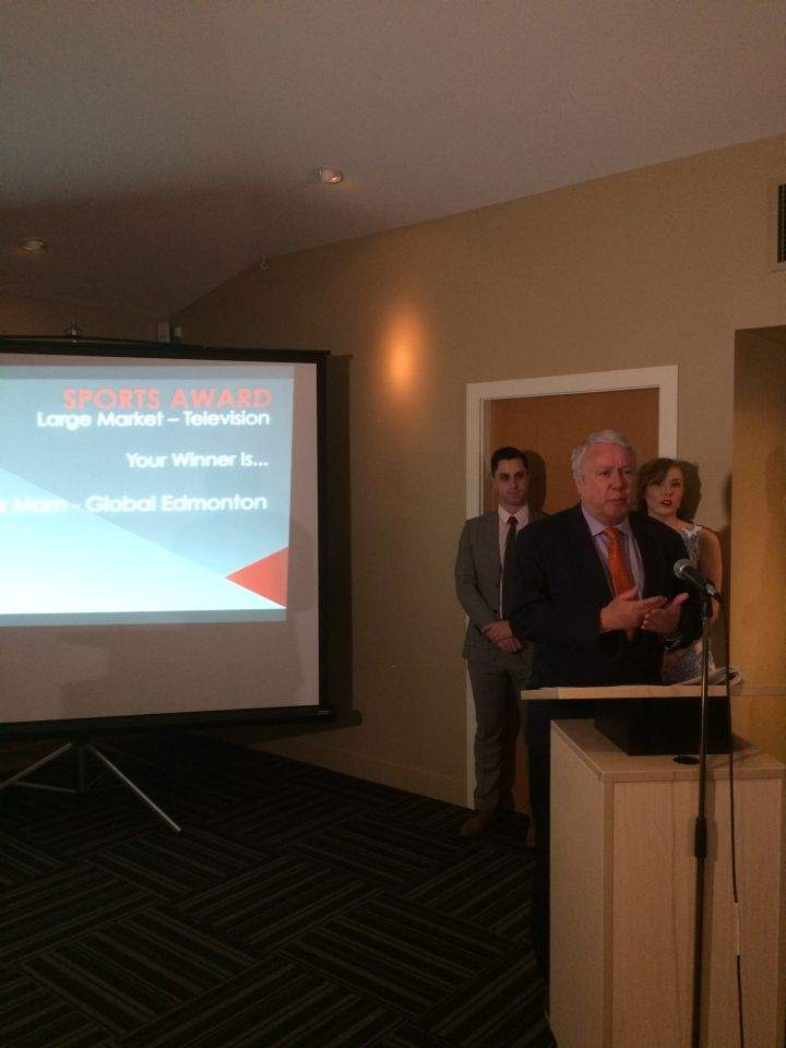 Global Edmonton station manager Tim Spelliscy accepts the RTDNA’s Prairie Region Sports Award (Large Market) for Global News Edmonton in Medicine Hat, Alta. on April 23, 2016.