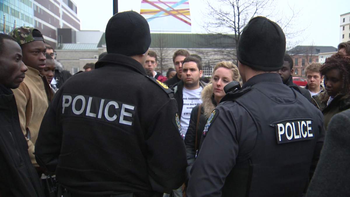 U of M Student Union President talks to police after being escorted from NB legislature