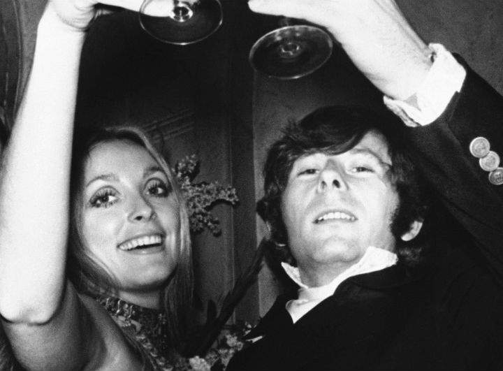 In this Feb. 18, 1969 file photo, Roman Polanski is shown with his wife, the actress Sharon Tate, toasting the opening of “Rosemary’s Baby” in London. (File photo)