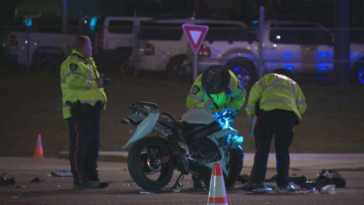 An SUV and a motorcycle collided on Yellowhead Trail at 97th Street in north Edmonton late Thursday night. April 28, 2016.