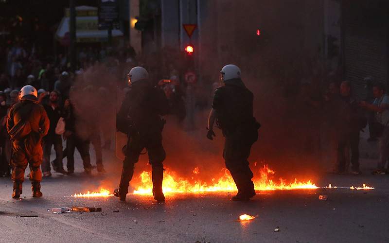 Riot police disperse demonstrators during minor clashes that broke out during a protest against reforms to the tax and pension system which are going to be voted on late on 08 May in the Greek parliament, in Athens, Greece, 08 May 2016.  