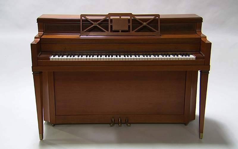 This April 5, 2016 image taken from video shows a piano owned by singer Lady Gaga in Culver City, Calif. Julien’s Auctions is offering the instrument in its "Music Icons" memorabilia sale at the Hard Rock Cafe New York. 