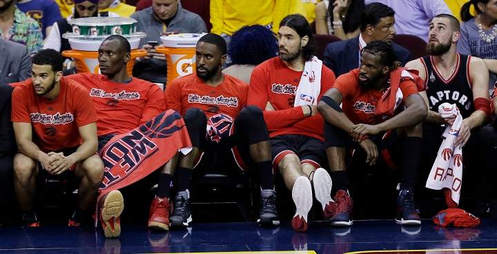 Toronto Raptors players sit on the bench during the second half of Game 5 of the NBA basketball Eastern Conference finals against the Cleveland Cavaliers on Wednesday, May 25, 2016, in Cleveland.