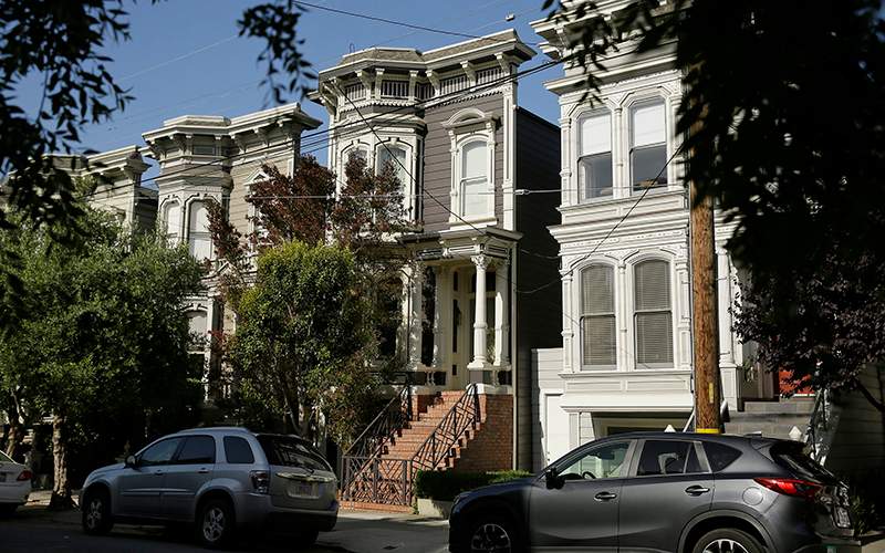 A Victorian home, center, made famous by the television show "Full House" is seen Friday, May 27, 2016, in San Francisco. 