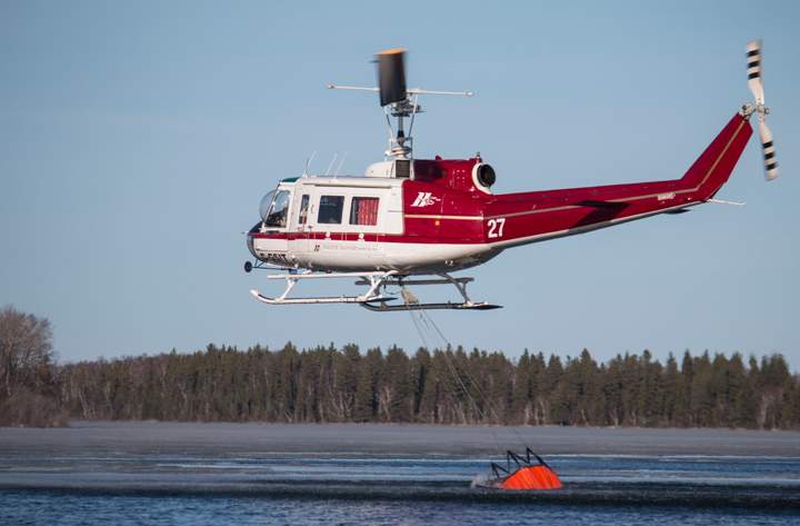 May 16: Elaine Kaloustian took this Your Saskatchewan photo at Lac La Ronge of a helicopter in a firefighting operation.