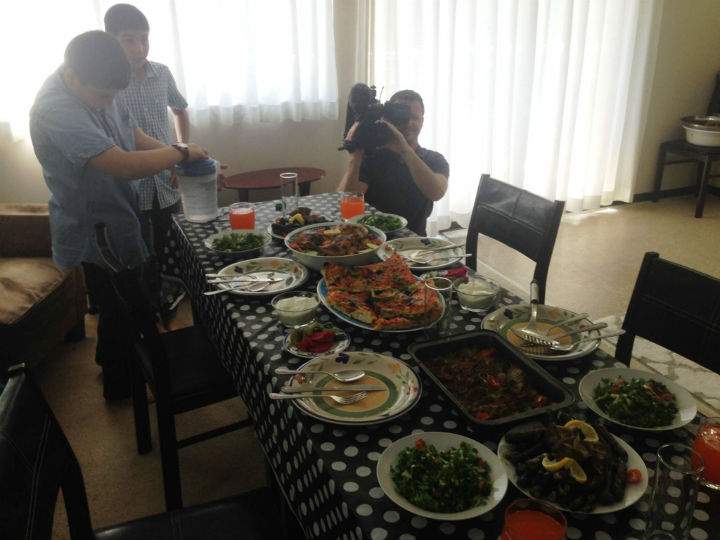 Six months after they first met in Jordan, the Mahameed family welcomed Mike Armstrong and his crew into their new home in the Vancouver-area, with a surprise Syrian feast.
