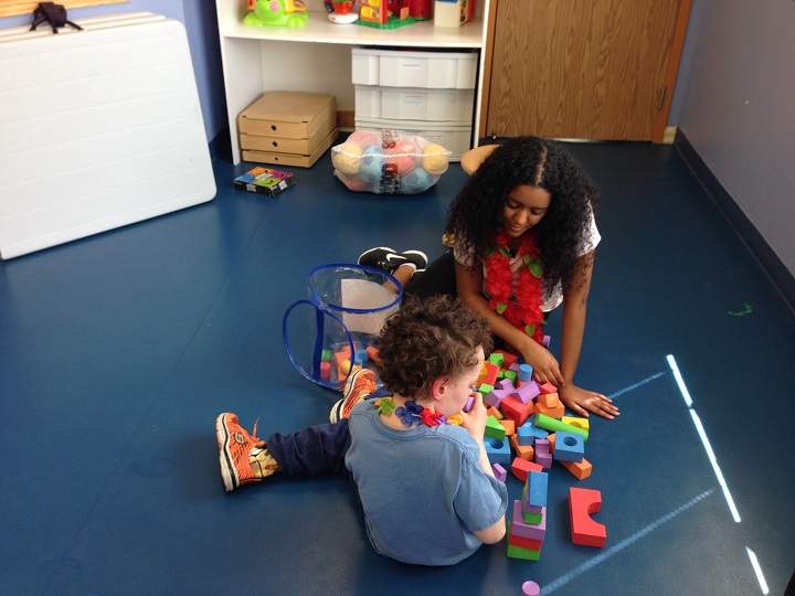 Bethel working alongside a student at the Movement Centre