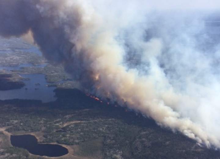 Aerial photo of wildfire burning at Caddy Lake. File Photo.