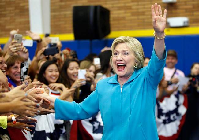 Democratic presidential candidate Hillary Clinton reacts as she arrives at a rally at the University of California, Riverside, Tuesday, May 24, 2016, in Riverside, Calif. 