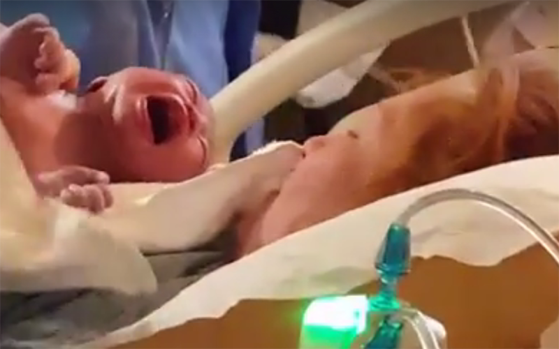 A screenshot of a live-stream being filmed by Fakamalo Kihe Eiki of the birth of his son.