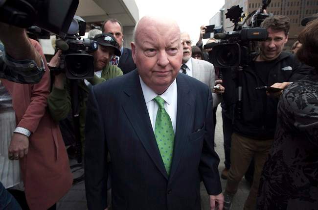 Sen. Mike Duffy leaves the courthouse after being acquitted on all charges Thursday, April 21, 2016 in Ottawa.