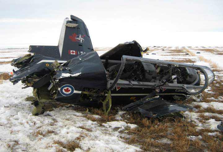 A Harvard II aircraft crashed into an empty field near Moose Jaw, Sask. on Jan. 24, 2014 after a flight instructor and student pilot ejected. 