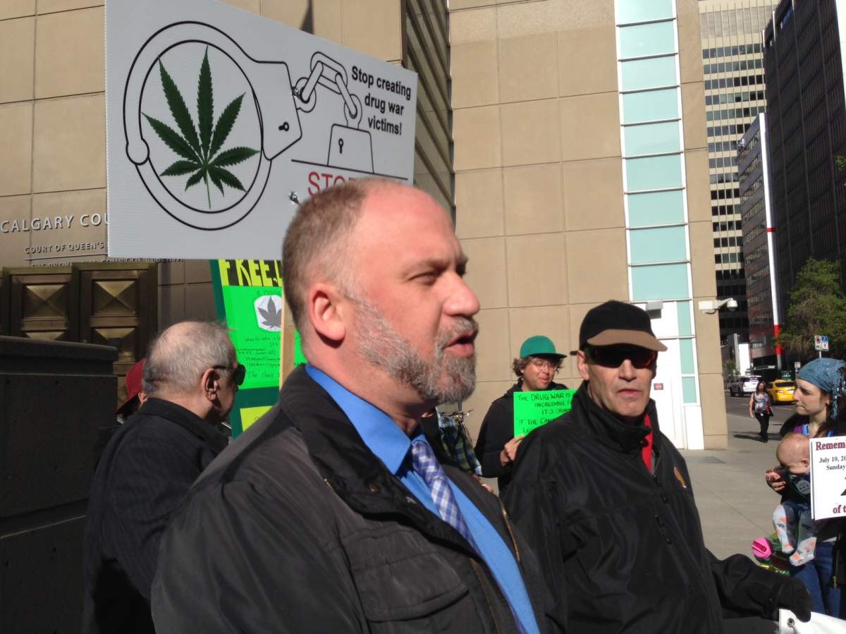 Marijuana activist Dana Larsen speaks to the media outside of a courthouse in Calgary on Wednesday, May 18, 2016.