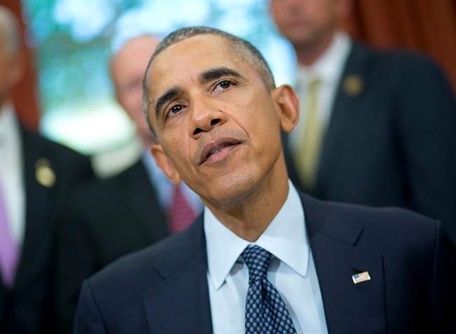 President Barack Obama speaks to members of the media in the Oval Office of the White House in Washington, Wednesday, May 11, 2016, before signing the Defend Trade Secrets Act of 2016 (DTSA). (AP Photo/Pablo Martinez Monsivais)
