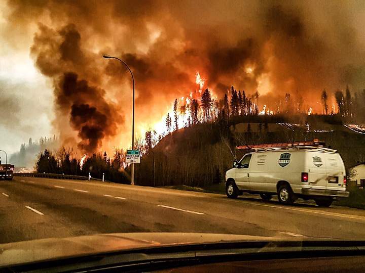 Fire erupts in the forest surrounding Fort McMurray, Alberta, on May 4, 2016.