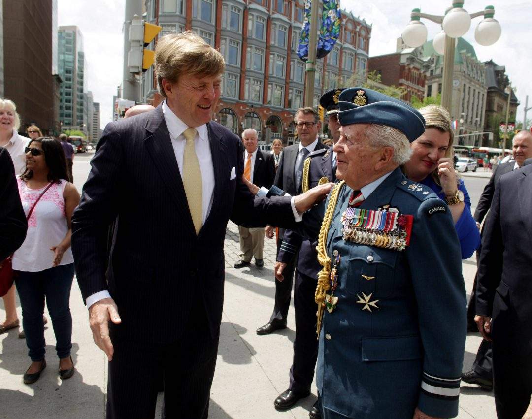 King Willem-Alexander (L) of the Netherlands speaks with Canadian retired Major-General Richard Rohmer after a wreath laying ceremony at The Tomb of the Unknown Soldier on May 27, 2015 in Ottawa, Canada.