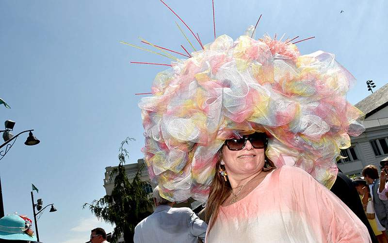 Derby attendee poses during the 142nd Kentucky Derby at Churchill Downs on May 07, 2016 in Louisville, Kentucky.  