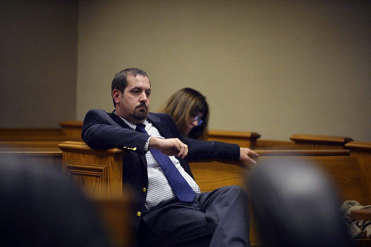 Mike Glasgow, suspended utilities director for the City of Flint, Mich., appears in Genesee District Court before agreeing to a plea agreement.
