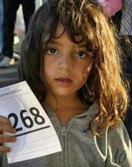 Mira Akram Al Jawabrah is shown in a family handout photo. Canadian relatives of a missing, five-year-old Syrian girl are appealing for help after a mysterious photograph (shown) surfaced on the Internet, suggesting she may have been the only member of her family to survive a bid to escape the war-ravaged country.
